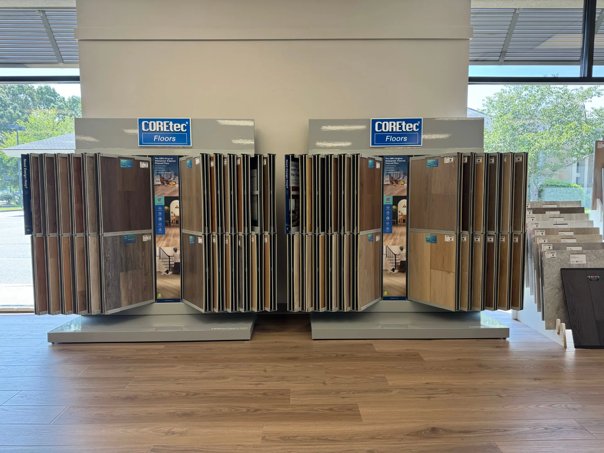 COREtec waterproof flooring display racks in the Carpet To Go Flooring showroom