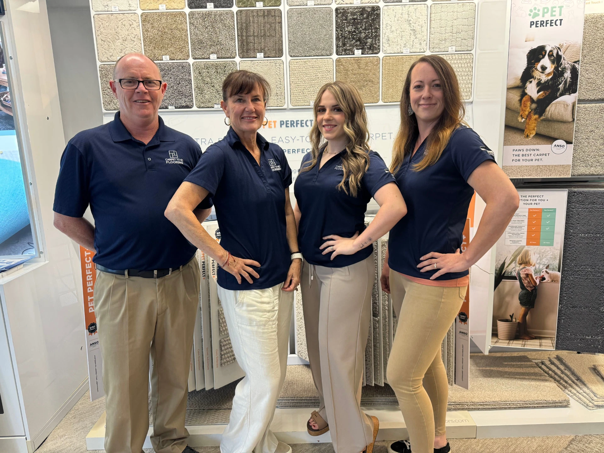 Carpet To Go Flooring sales and design team in the Charleston showroom